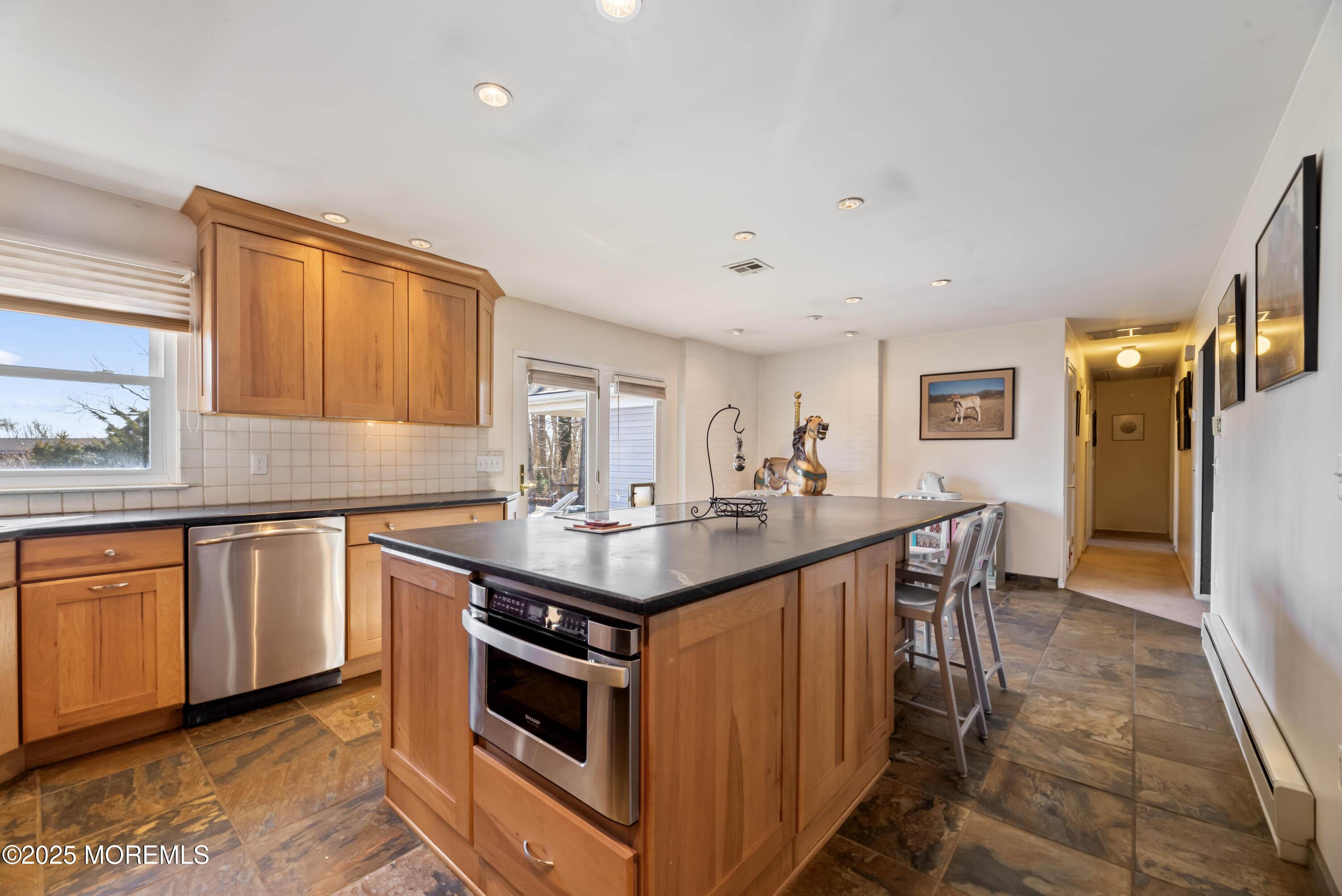 35 Rues Road Cream Ridge, NJ 08514 - Photo 27 of 46 a kitchen with stainless steel appliances granite countertop a sink and a refrigerator