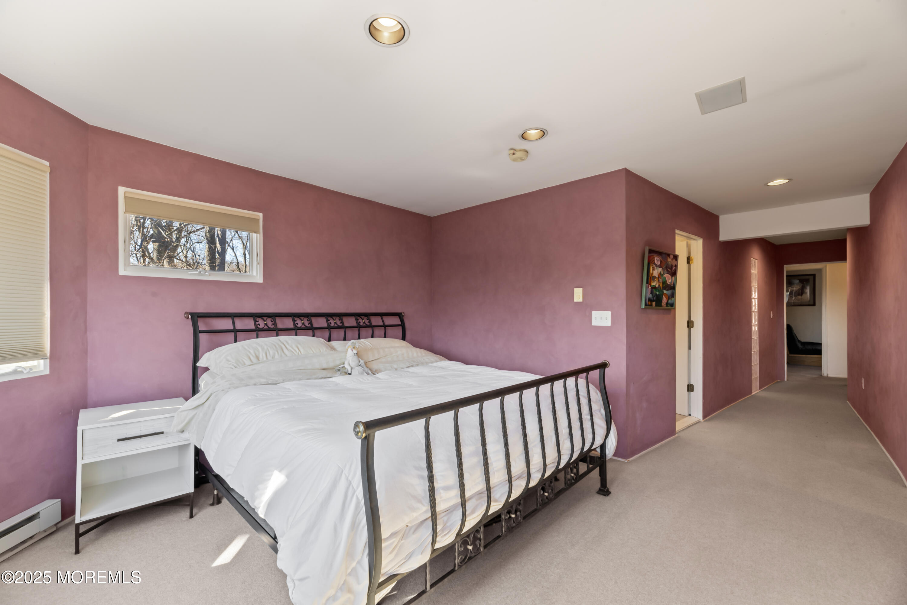 35 Rues Road Cream Ridge, NJ 08514 - Photo 38 of 46 a spacious bedroom with a bed and a table