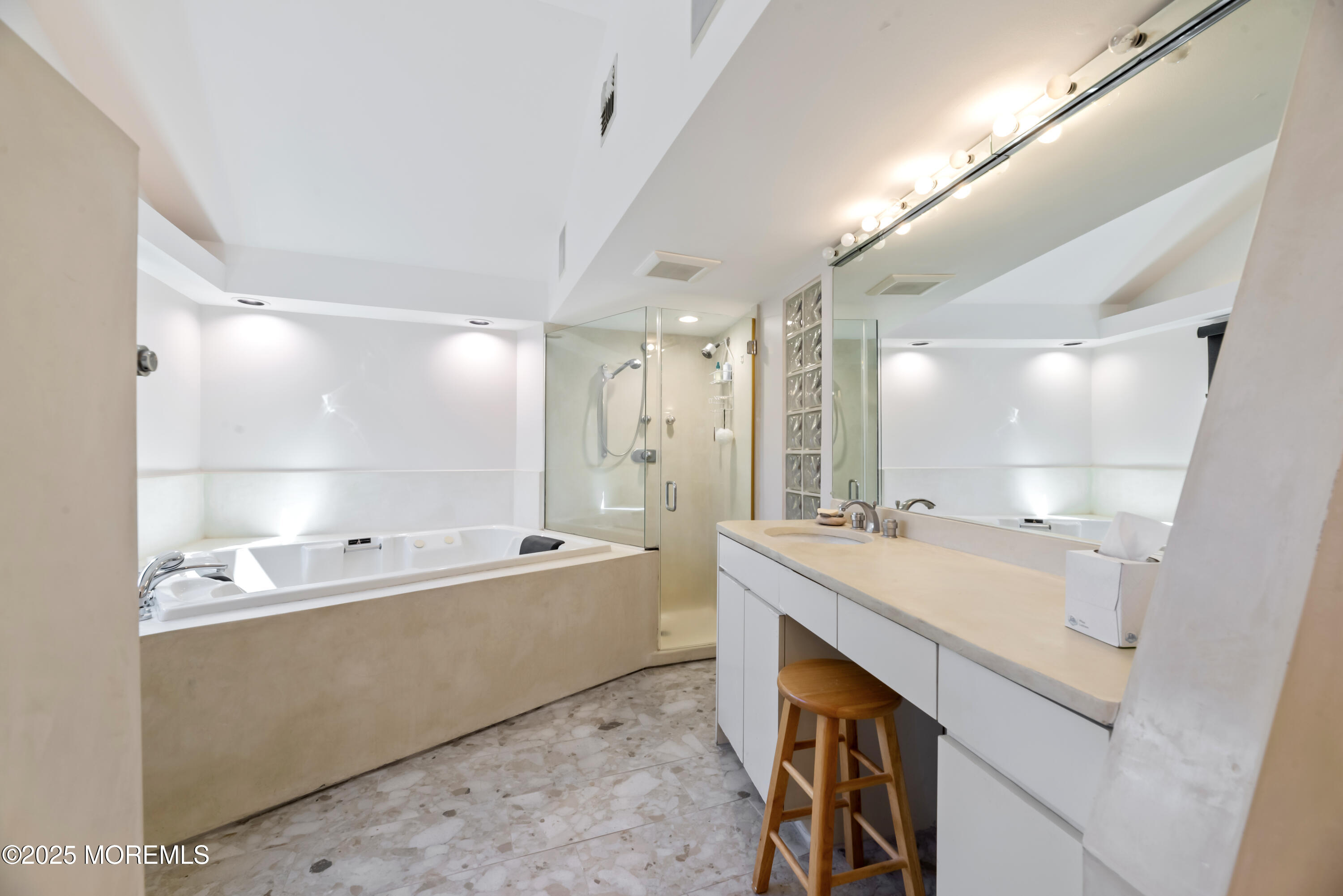 35 Rues Road Cream Ridge, NJ 08514 - Photo 40 of 46 a bathroom with a tub double vanity sink and mirror
