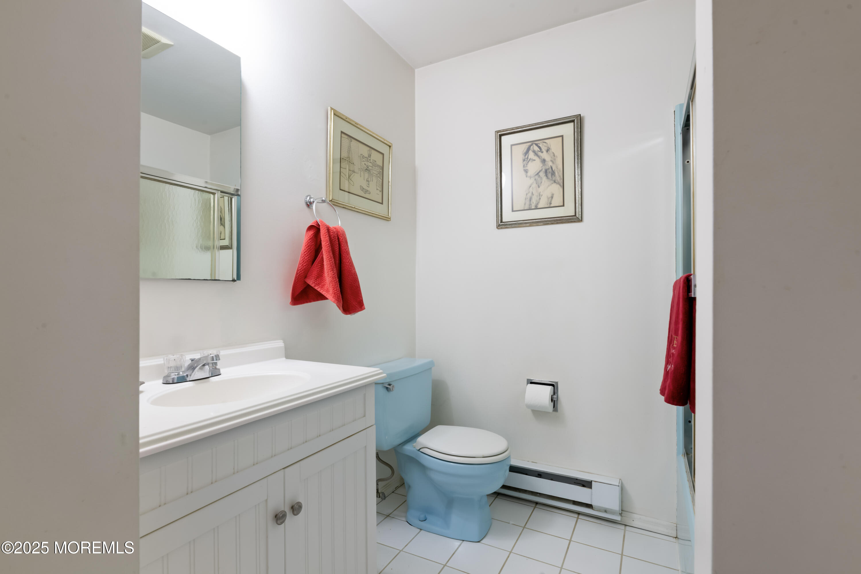 35 Rues Road Cream Ridge, NJ 08514 - Photo 44 of 46 a bathroom with a toilet a sink and a mirror