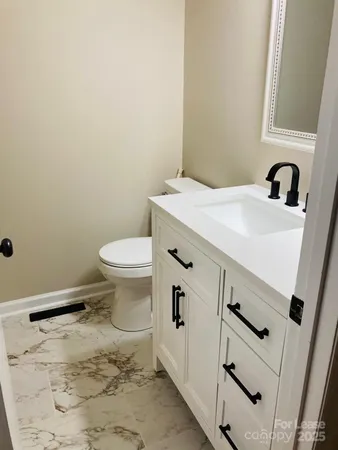 a bathroom with a sink and a toilet