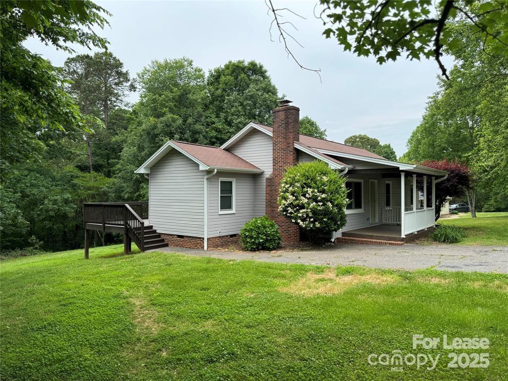 2177 Lynmore Drive Sherrills Ford, NC 28673 - Photo 3 of 18 a view of a house with a yard and tree s