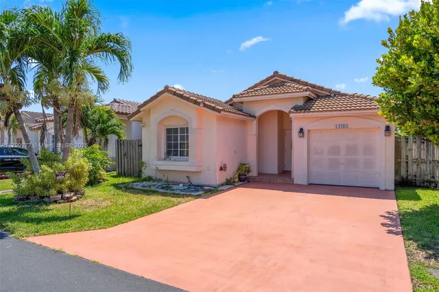 $557,000 | 14202 Southwest 151st Court, Miami, FL 33196