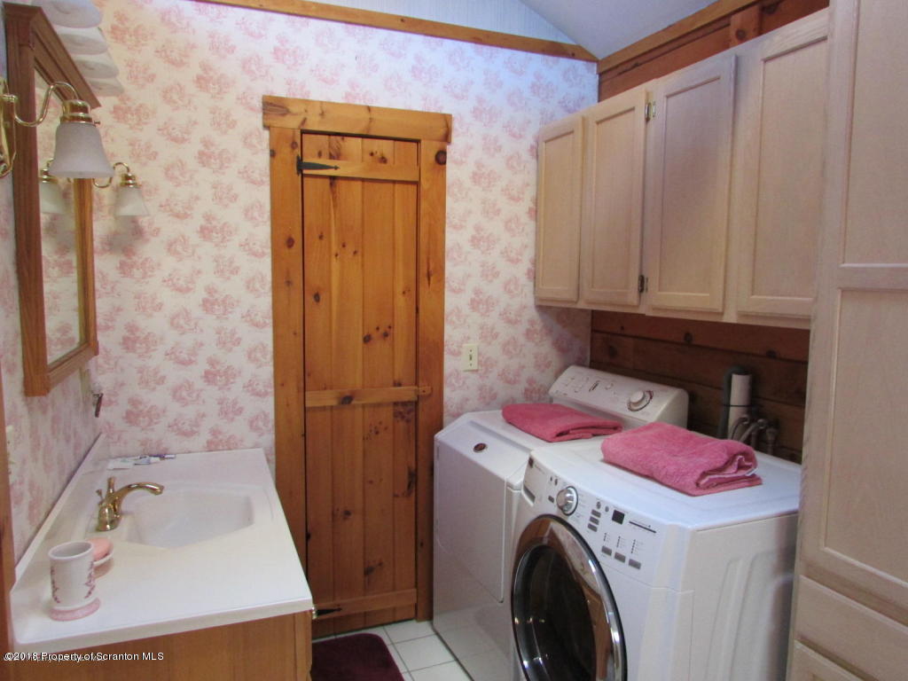 11068 State Rte 3023 Montrose, PA 18801 - Photo 15 of 38 a utility room with dryer and washer