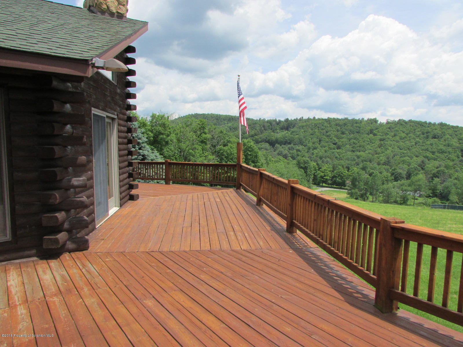 11068 State Rte 3023 Montrose, PA 18801 - Photo 2 of 38 a view of balcony with wooden floor and fence
