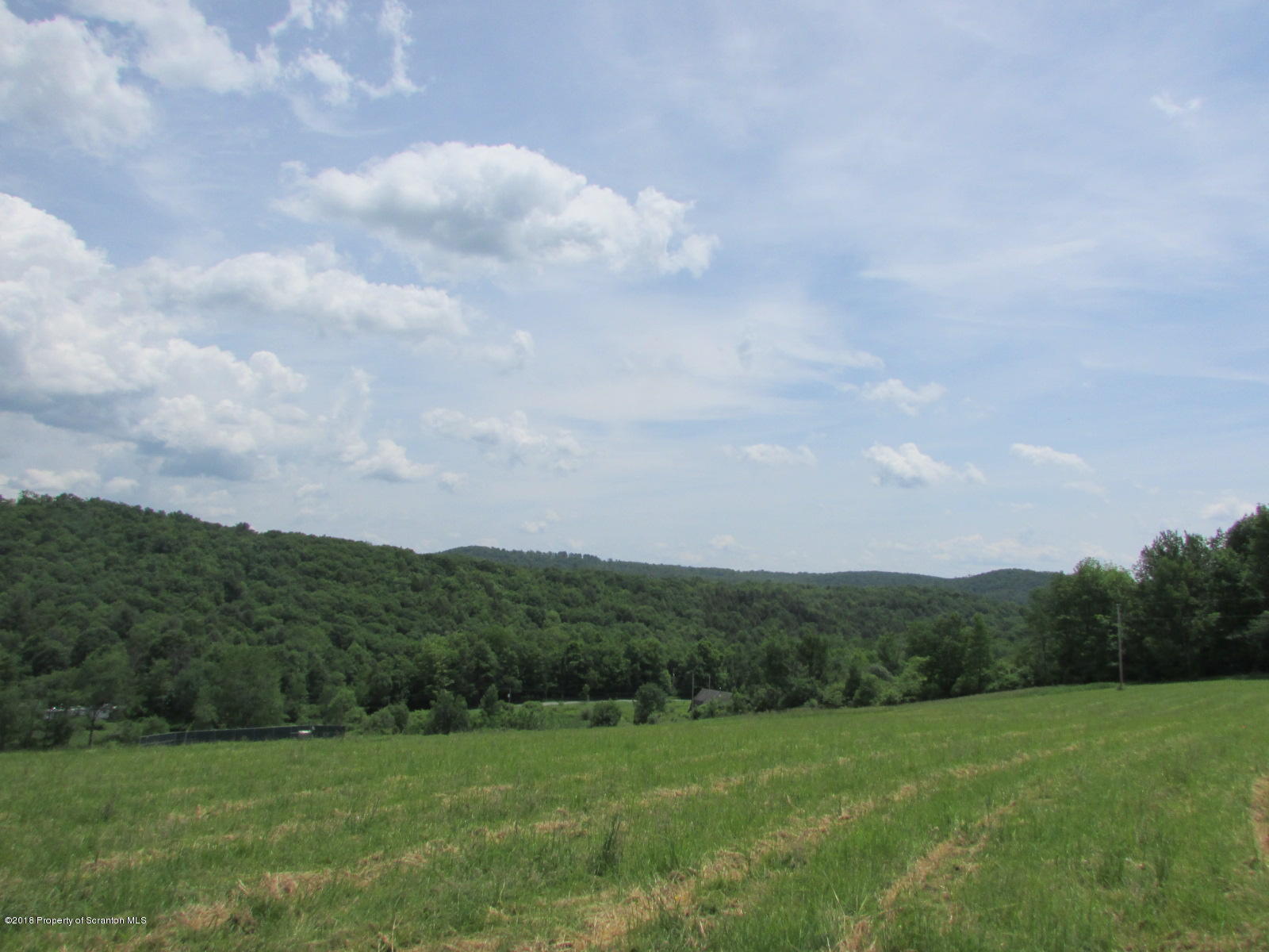 11068 State Rte 3023 Montrose, PA 18801 - Photo 27 of 38 a view of grassy field with mountain