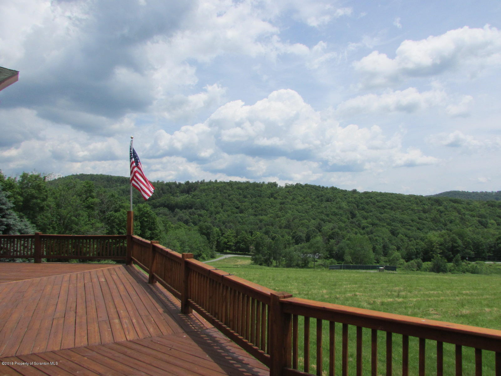 11068 State Rte 3023 Montrose, PA 18801 - Photo 31 of 38 a view of a balcony with wooden fence