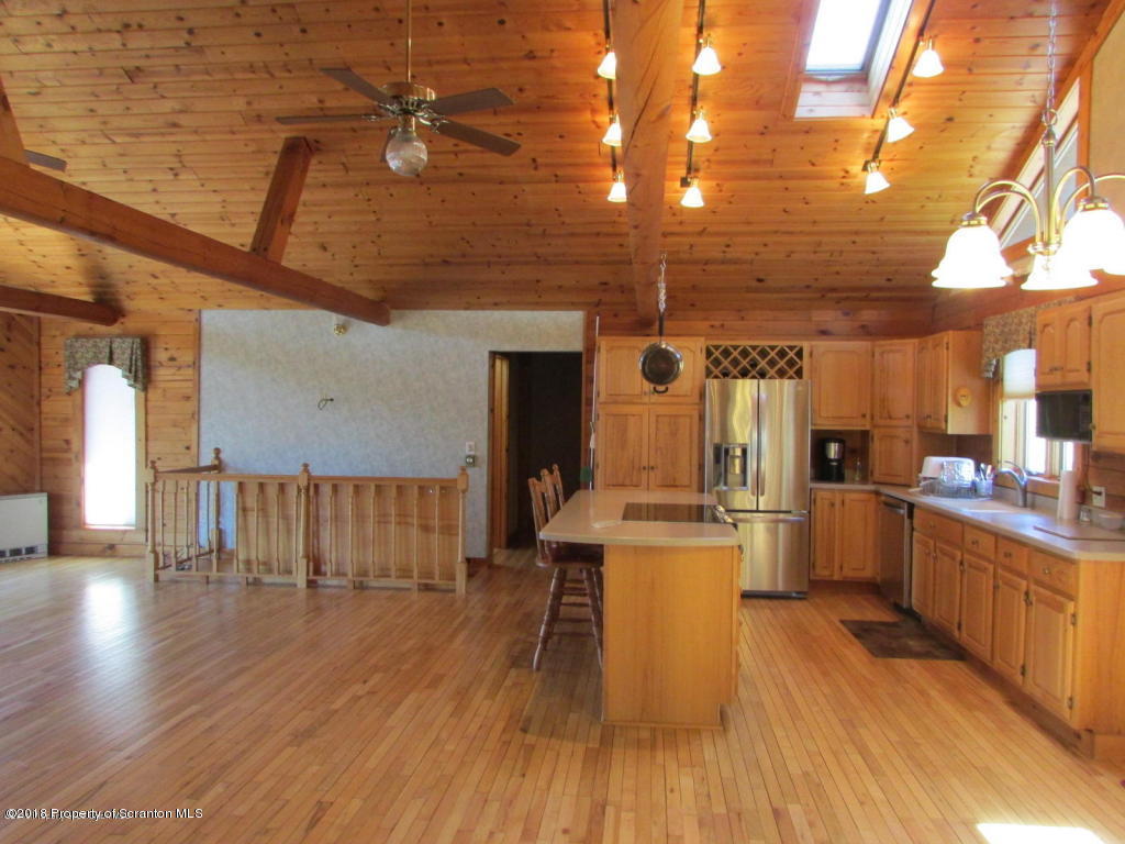 11068 State Rte 3023 Montrose, PA 18801 - Photo 7 of 38 a view of a kitchen with cabinets