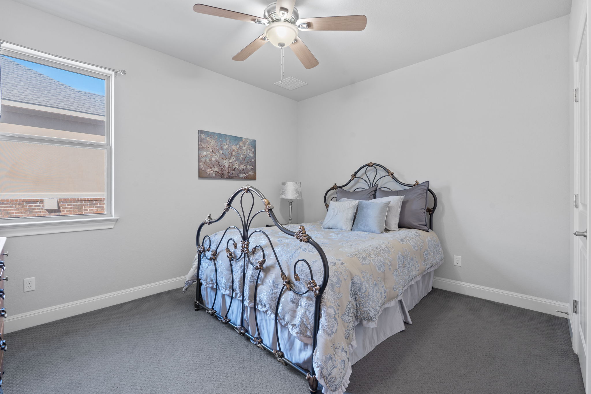 4212 Borho Ranch Street Leander, TX 78641 - Photo 19 of 29 a bedroom with two beds and window