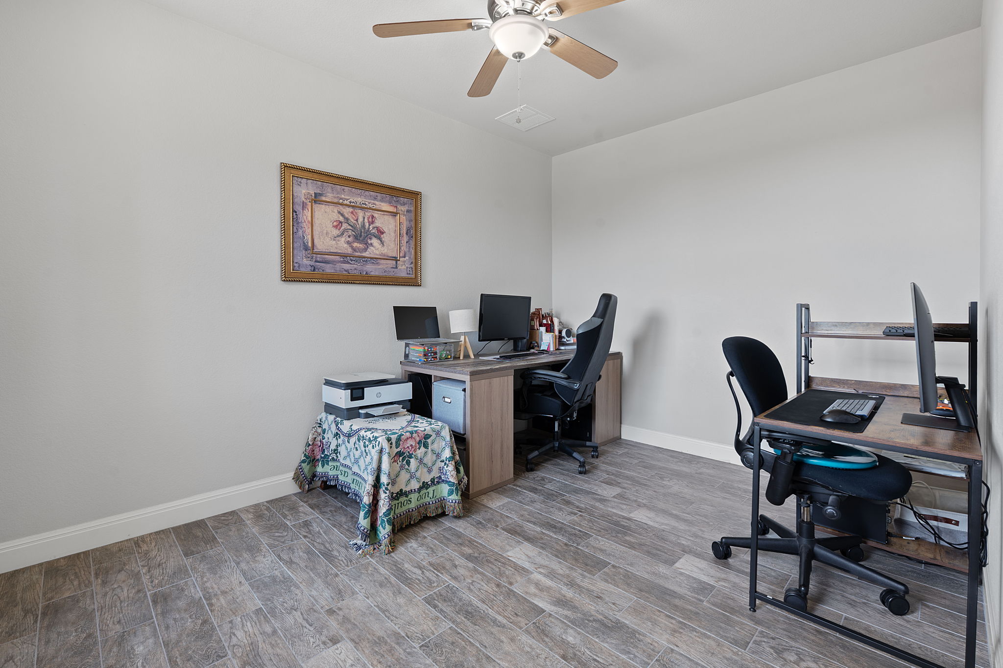 4212 Borho Ranch Street Leander, TX 78641 - Photo 24 of 29 a view of a workspace with furniture and a window