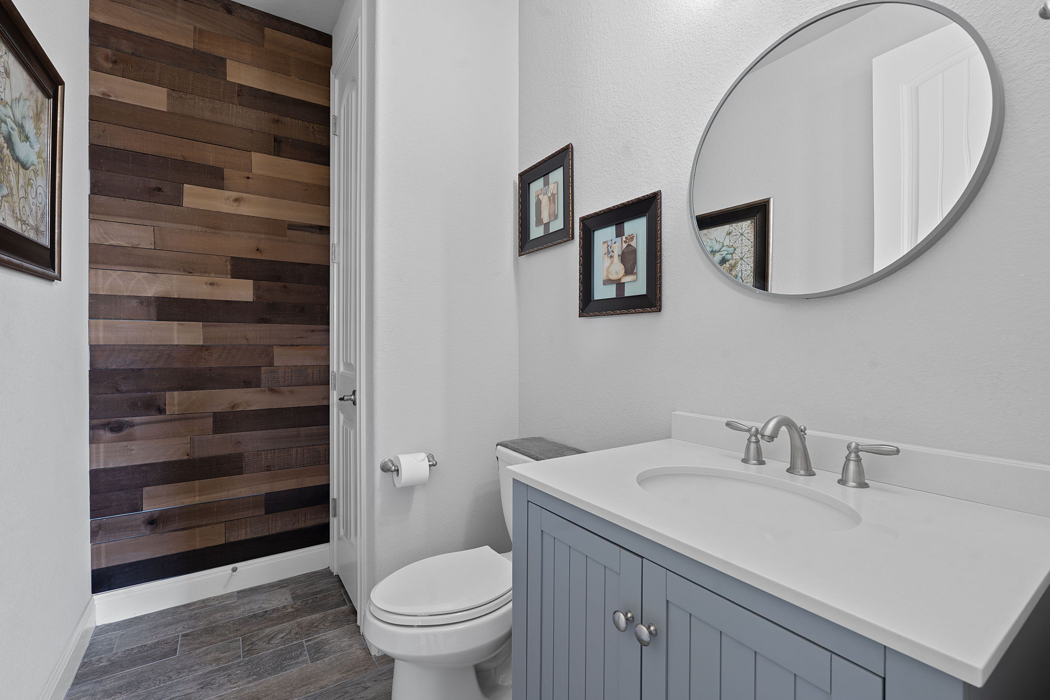 4212 Borho Ranch Street Leander, TX 78641 - Photo 25 of 29 a bathroom with a sink a toilet and a mirror