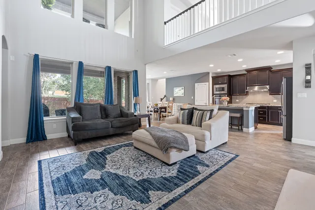 a living room with furniture and a couch