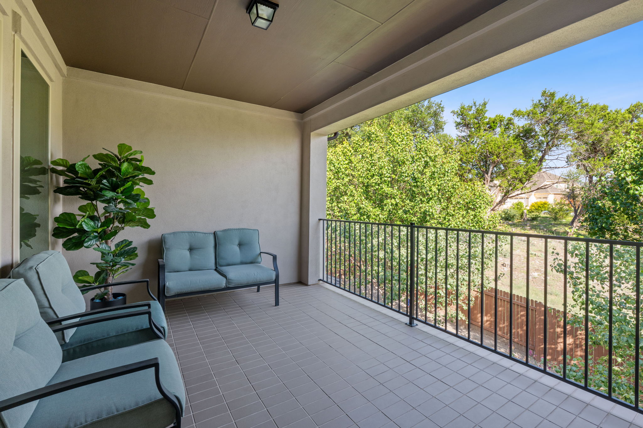 4212 Borho Ranch Street Leander, TX 78641 - Photo 10 of 29 a balcony with furniture and a potted plant