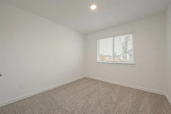 an empty room with closet