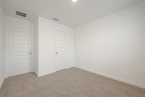 an empty room with closet