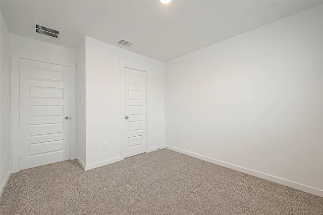 an empty room with closet