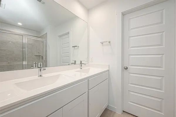 a bathroom with a sink and a bathtub