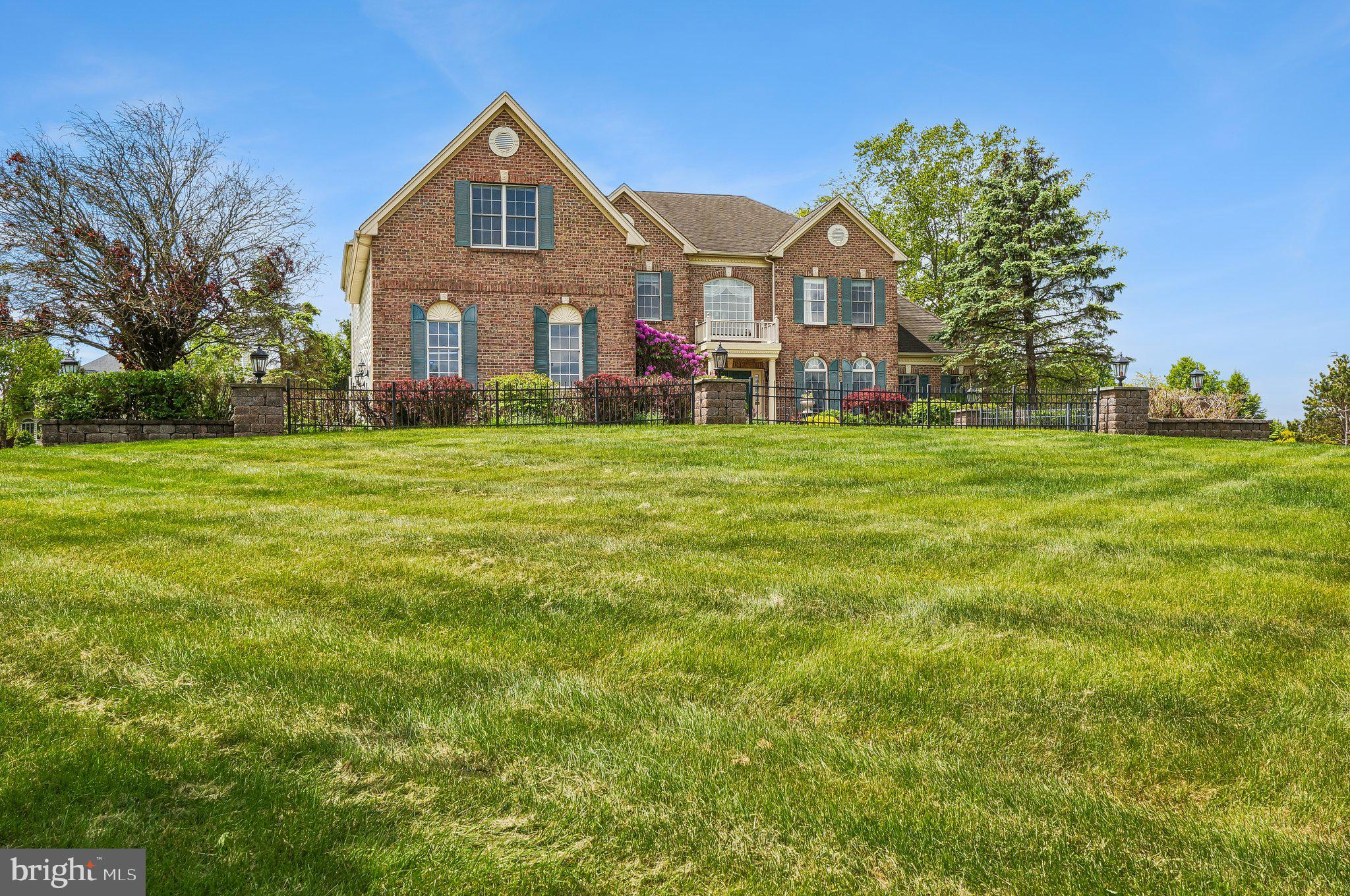 1 Baker Way Pennington, NJ 08534 - Photo 68 of 77 a front view of a house with a yard