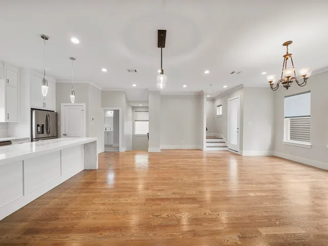 a view of a kitchen and a chandelier