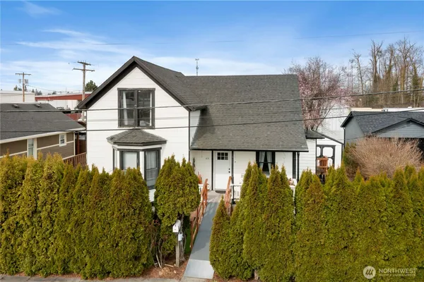 front view of a house with a yard