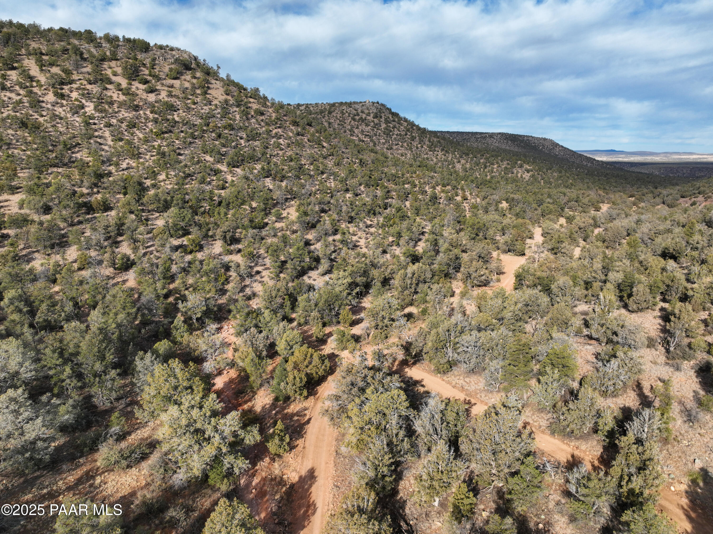 0 Arizona Ash Fork, AZ 86320 - Photo 14 of 47 a view of a large building with mountains in the background