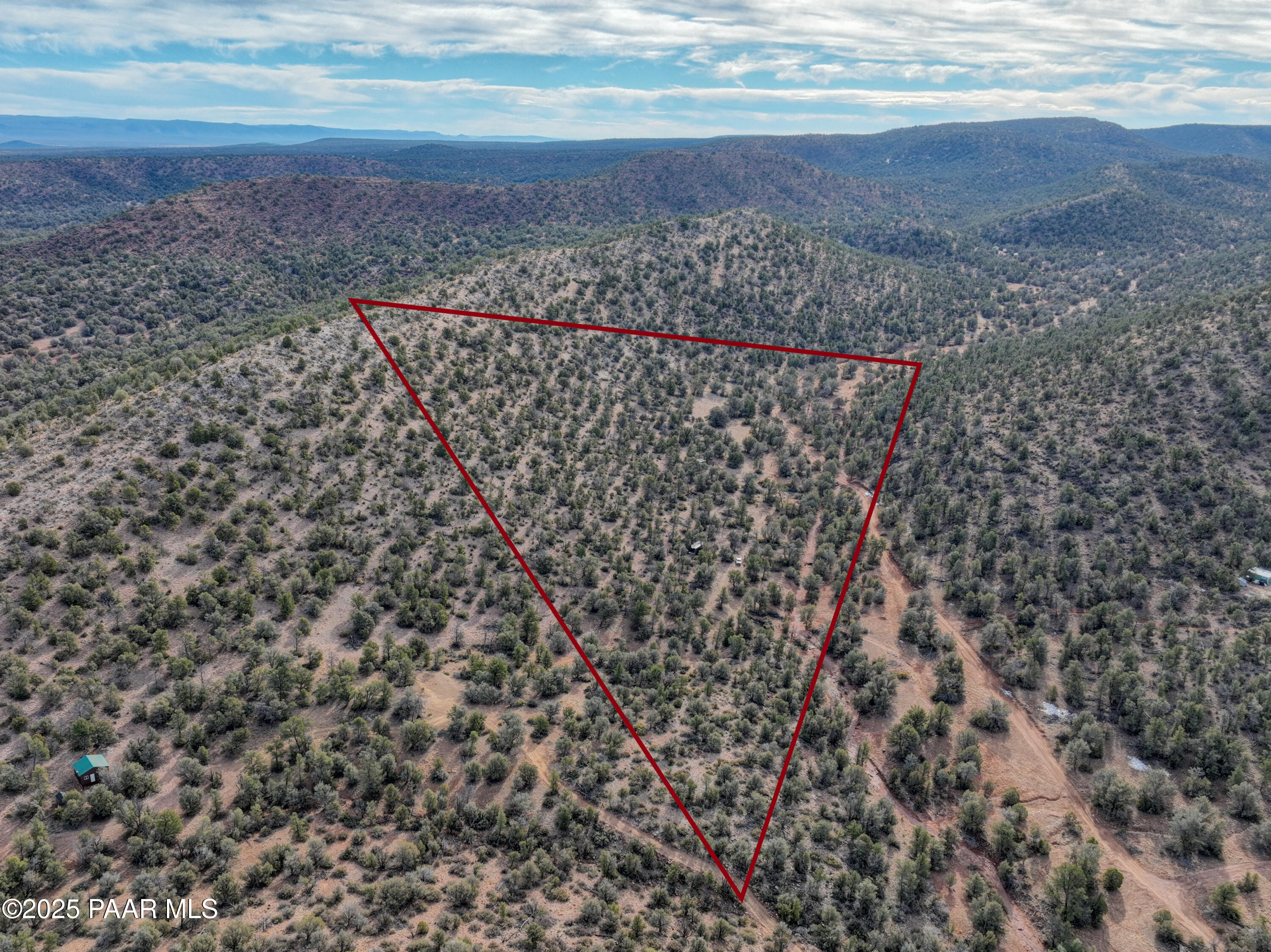 0 Arizona Ash Fork, AZ 86320 - Photo 2 of 47 a view of a dry yard with wooden floor and fence