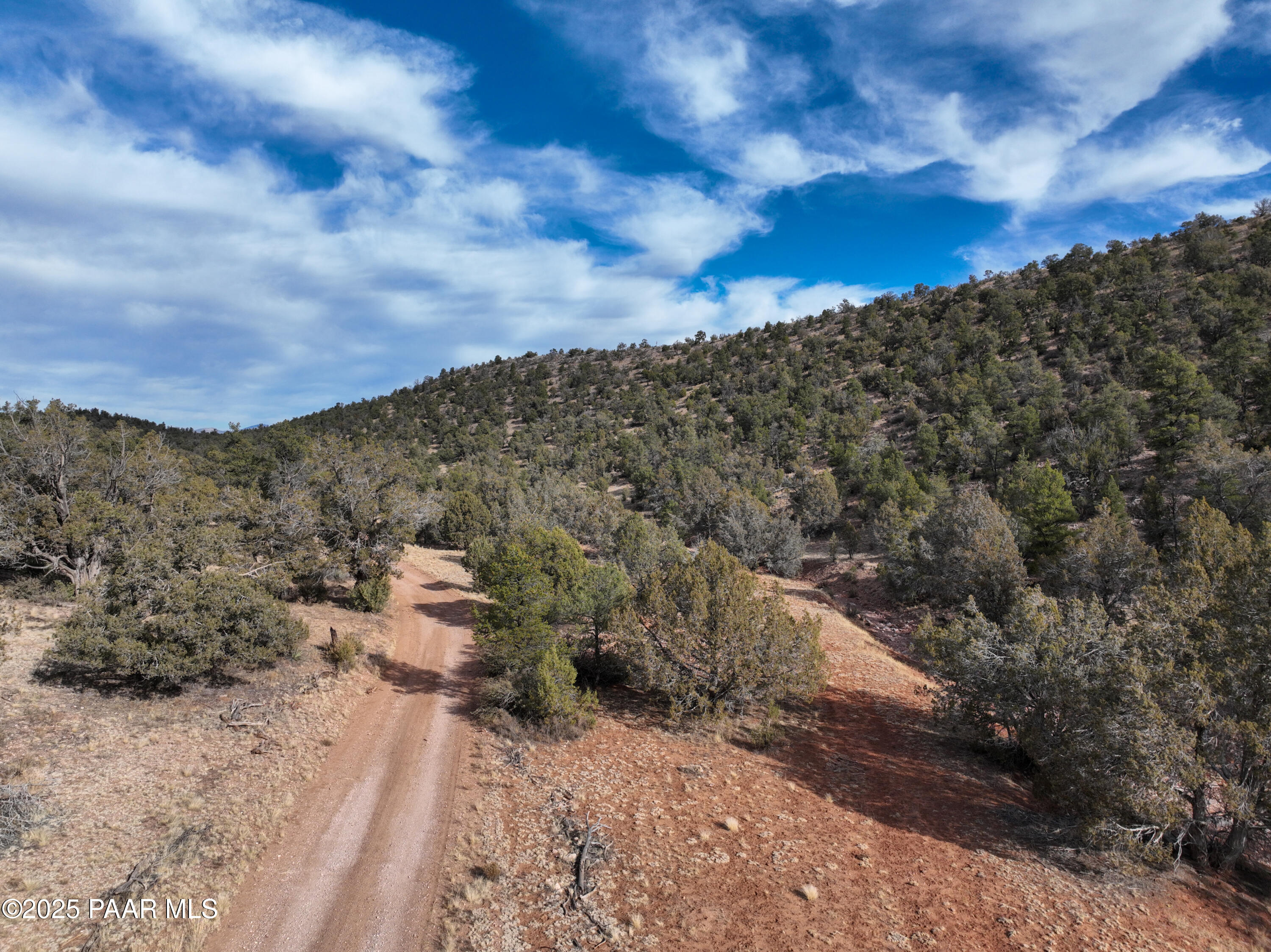 0 Arizona Ash Fork, AZ 86320 - Photo 37 of 47 a view of a large building with mountains in the background
