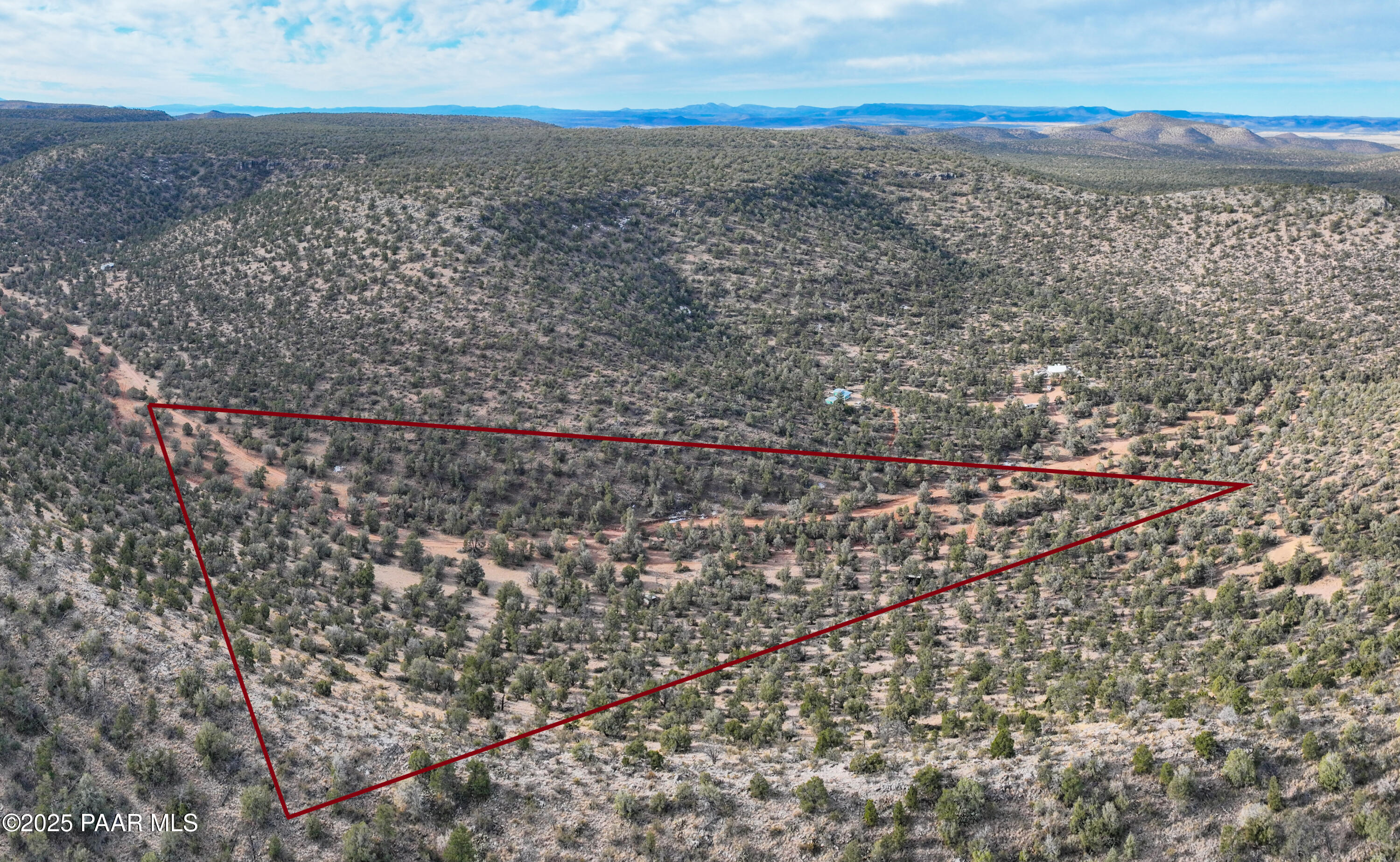 0 Arizona Ash Fork, AZ 86320 - Photo 5 of 47 a view of a dry yard with wooden floor and a lake view