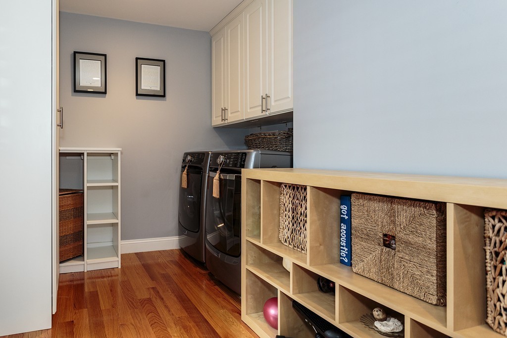 40 Catherine Street, Unit 2 Boston, MA 02131 - Photo 13 of 26 a view of walk in closet with clothes and shoes