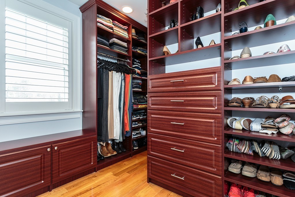 40 Catherine Street, Unit 2 Boston, MA 02131 - Photo 20 of 26 a view of walk in closet with clothes and shoes
