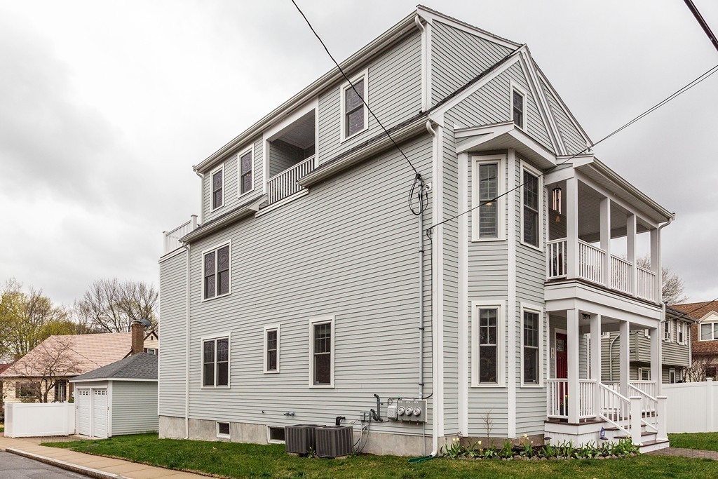 40 Catherine Street, Unit 2 Boston, MA 02131 - Photo 26 of 26 a view of a house with a yard
