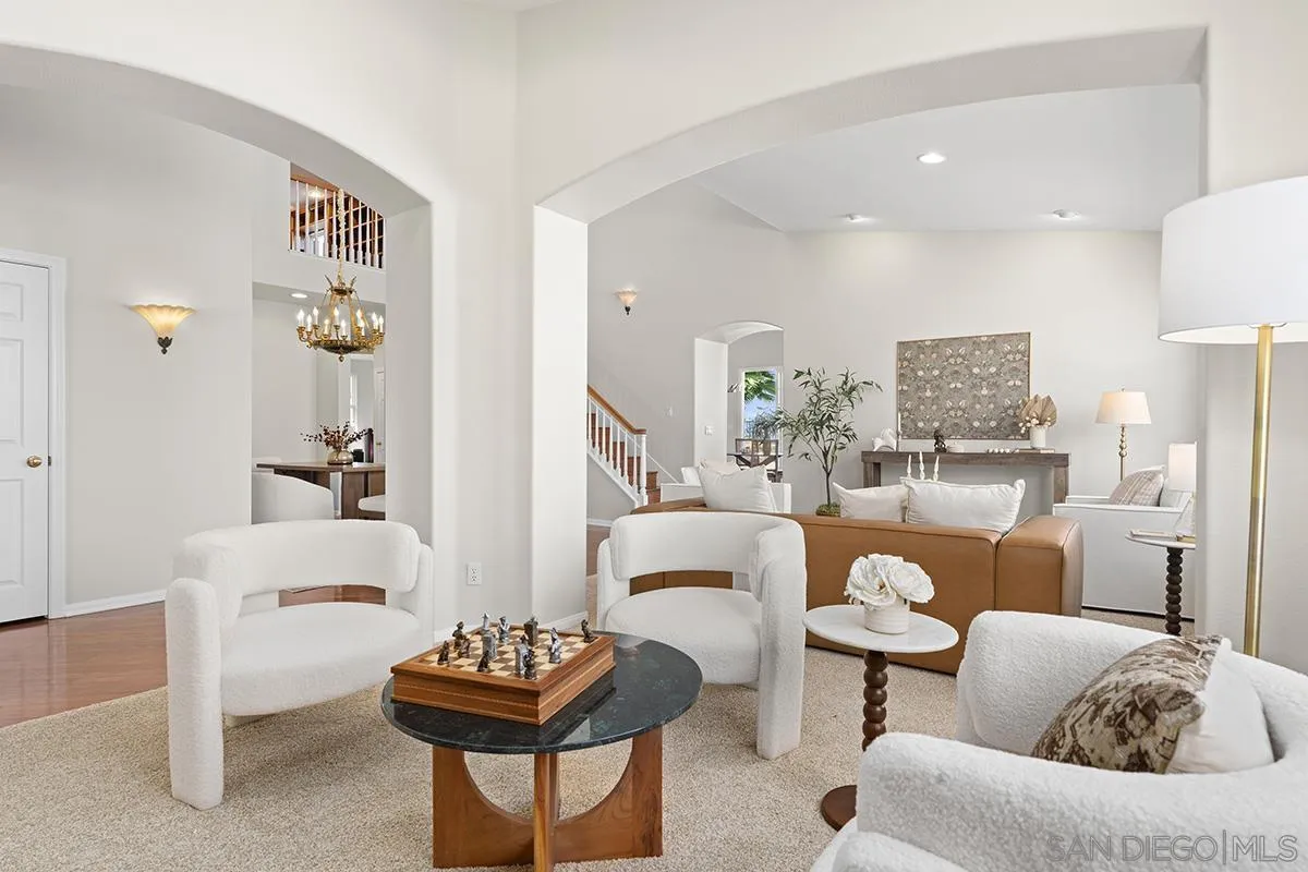 987 Palencia Court Chula Vista, CA 91910 - Photo 1 of 70 a living room with furniture and a mirror