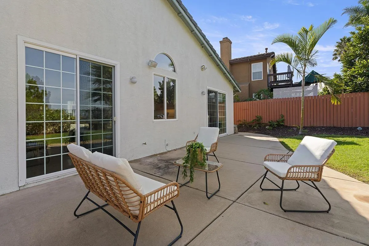 987 Palencia Court Chula Vista, CA 91910 - Photo 59 of 70 a view of a house with backyard and sitting area
