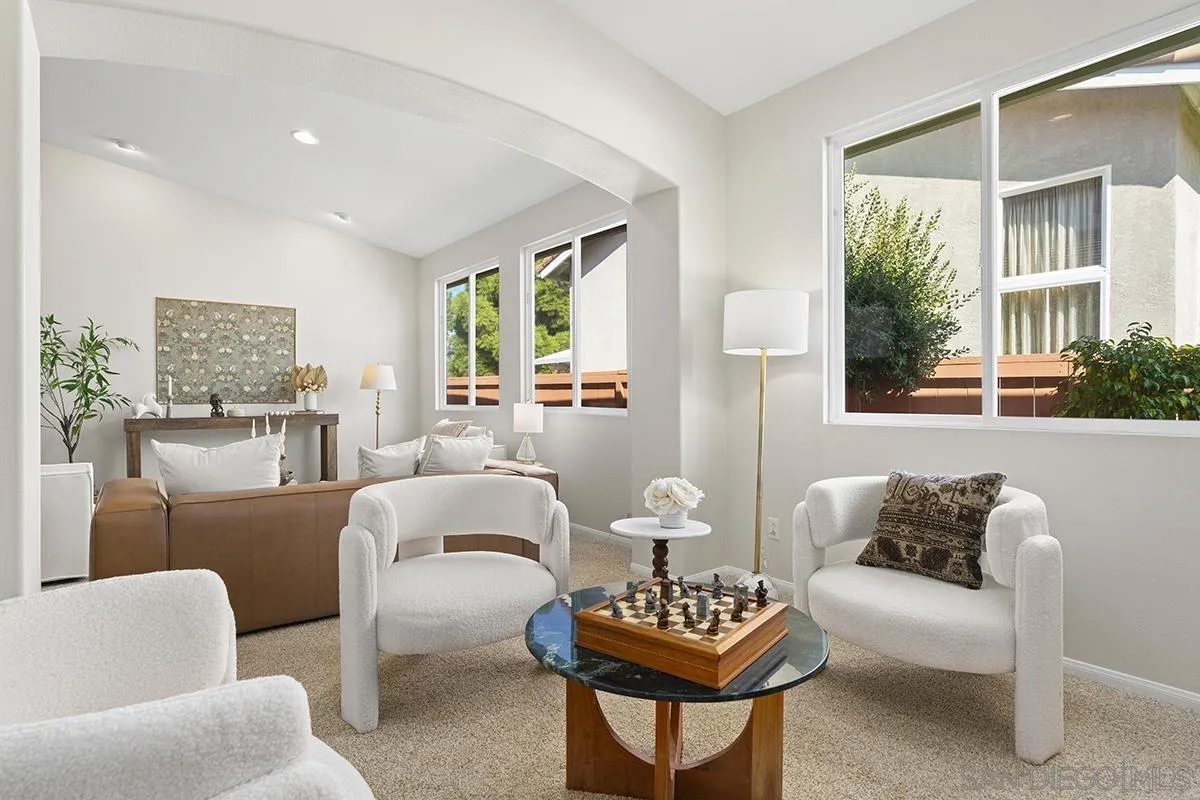 987 Palencia Court Chula Vista, CA 91910 - Photo 7 of 70 a living room with furniture and a large window