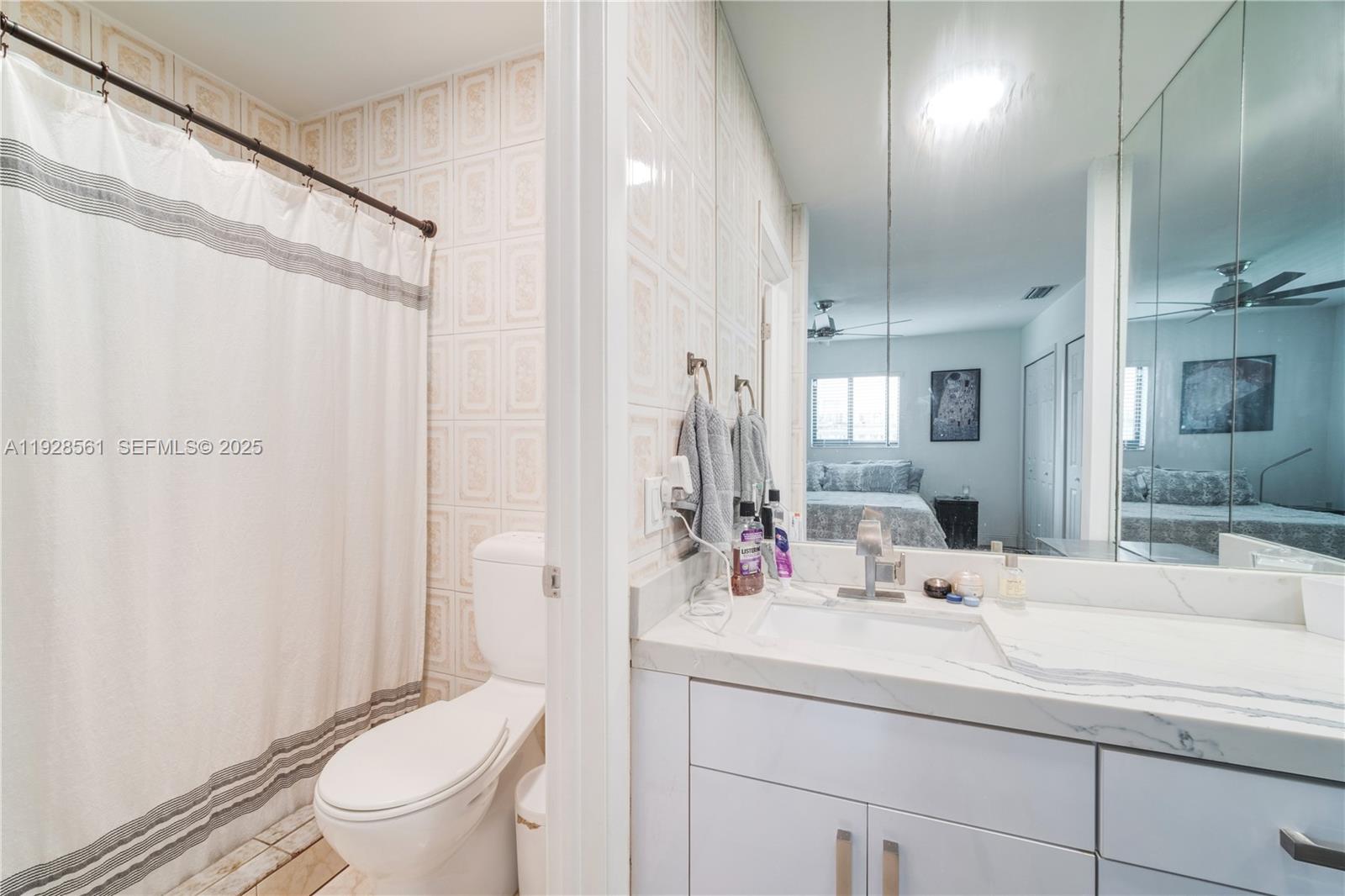 10350 Southwest 4th Street Sweetwater, FL 33174 - Photo 20 of 27 a bathroom with a sink toilet and shower