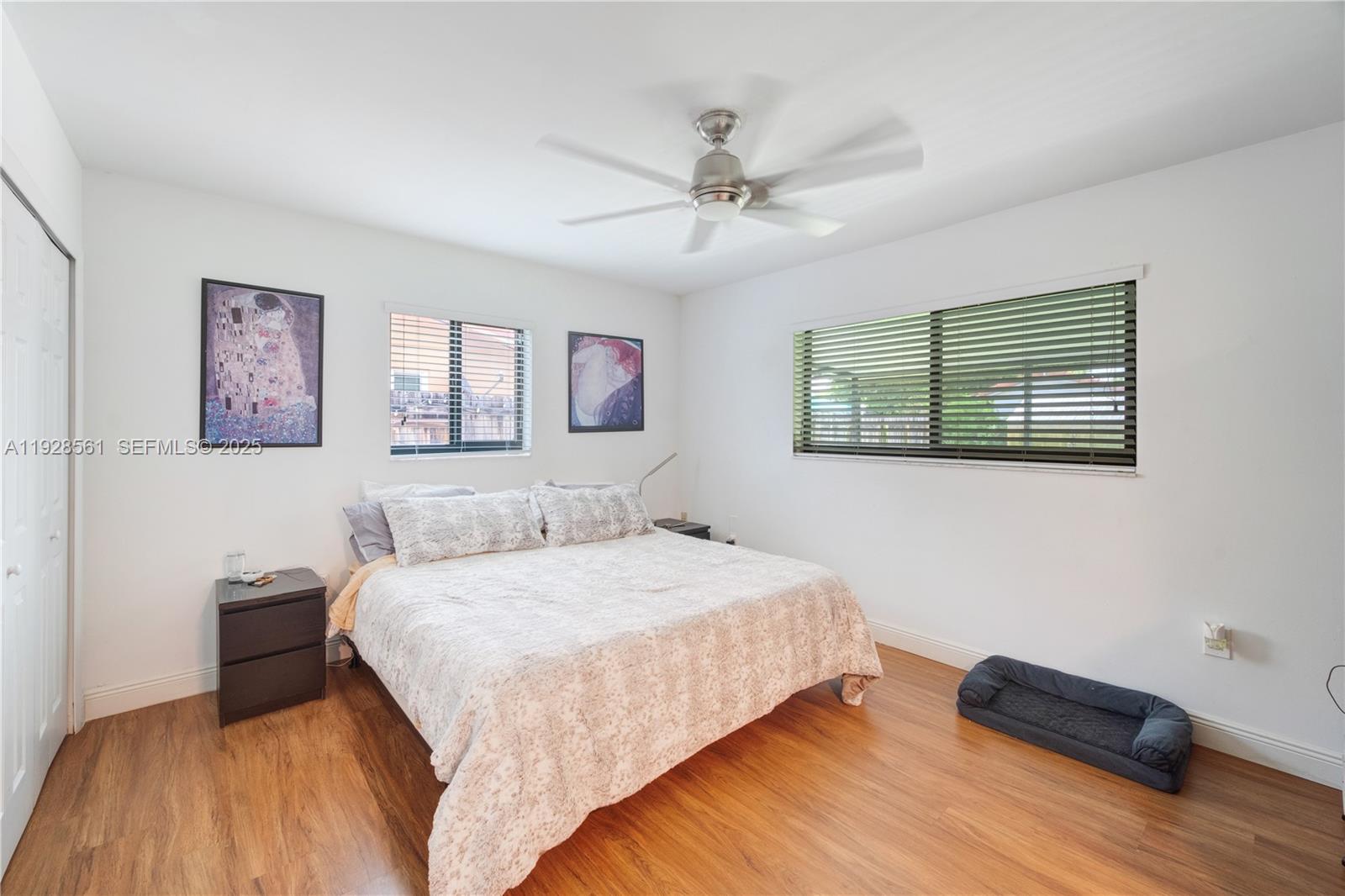 10350 Southwest 4th Street Sweetwater, FL 33174 - Photo 22 of 27 a bedroom with a bed and a dresser