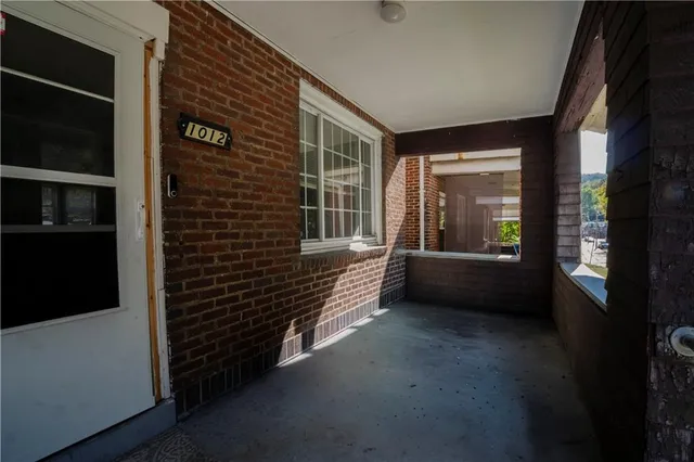a view of a balcony with an outdoor space