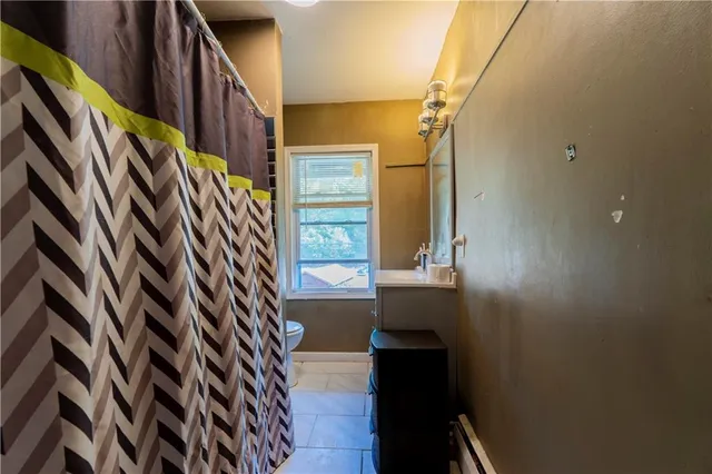 a view of staircase with wooden floor