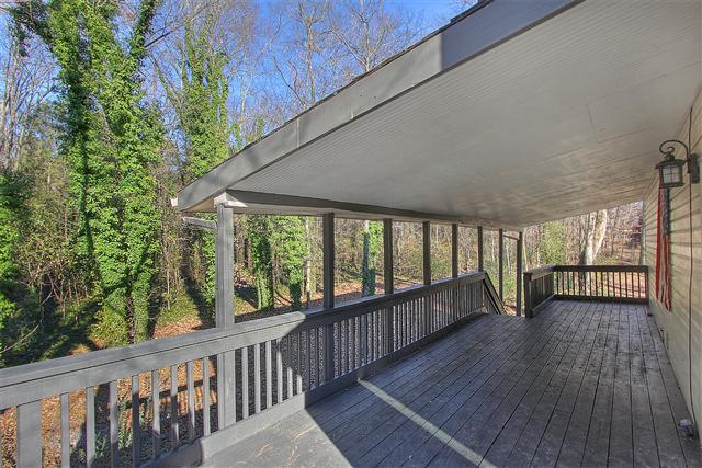 5590 Vanderbilt Road Old Hickory, TN 37138 - Photo 19 of 20 The huge deck is covered in the back and allows for a great place to gather with family and friends no matter rain or shine.