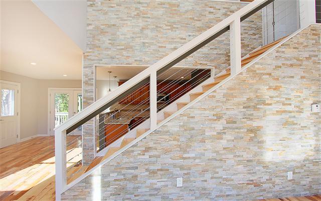 5590 Vanderbilt Road Old Hickory, TN 37138 - Photo 8 of 20 New rock facing on walls around stairs leading up to the top level. A great space to entertain any time of the year.