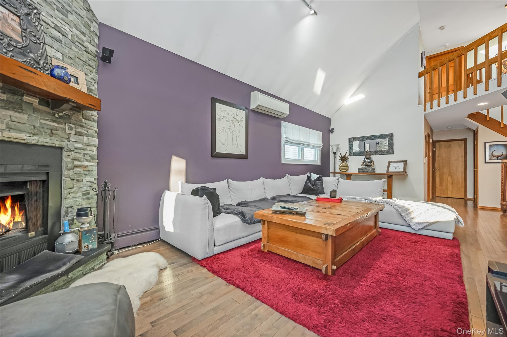 2 Martin Place Northport, NY 11768 - Photo 11 of 24 a living room with furniture and a fireplace
