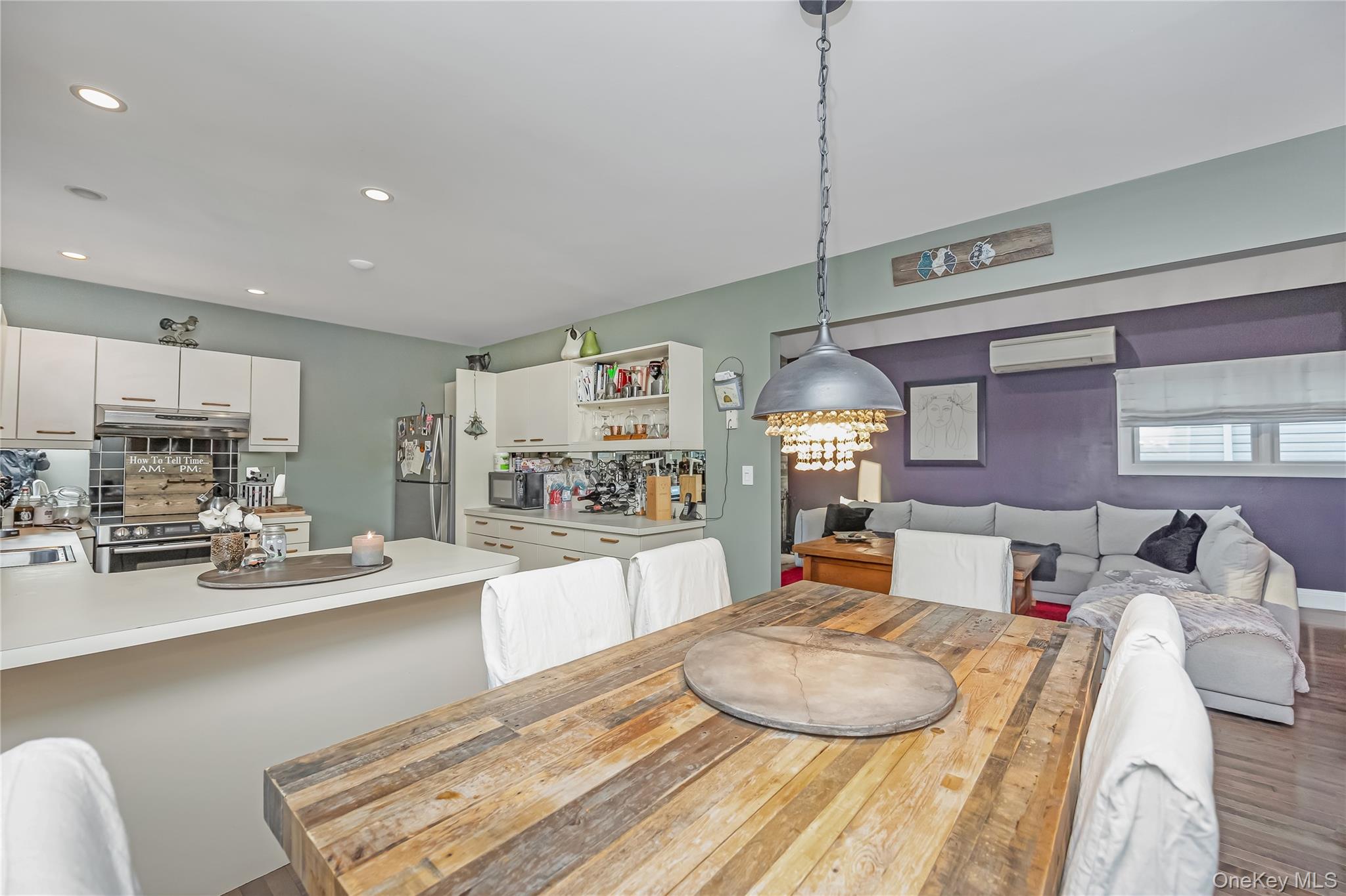2 Martin Place Northport, NY 11768 - Photo 14 of 24 a large kitchen with a table chairs and a wooden floor