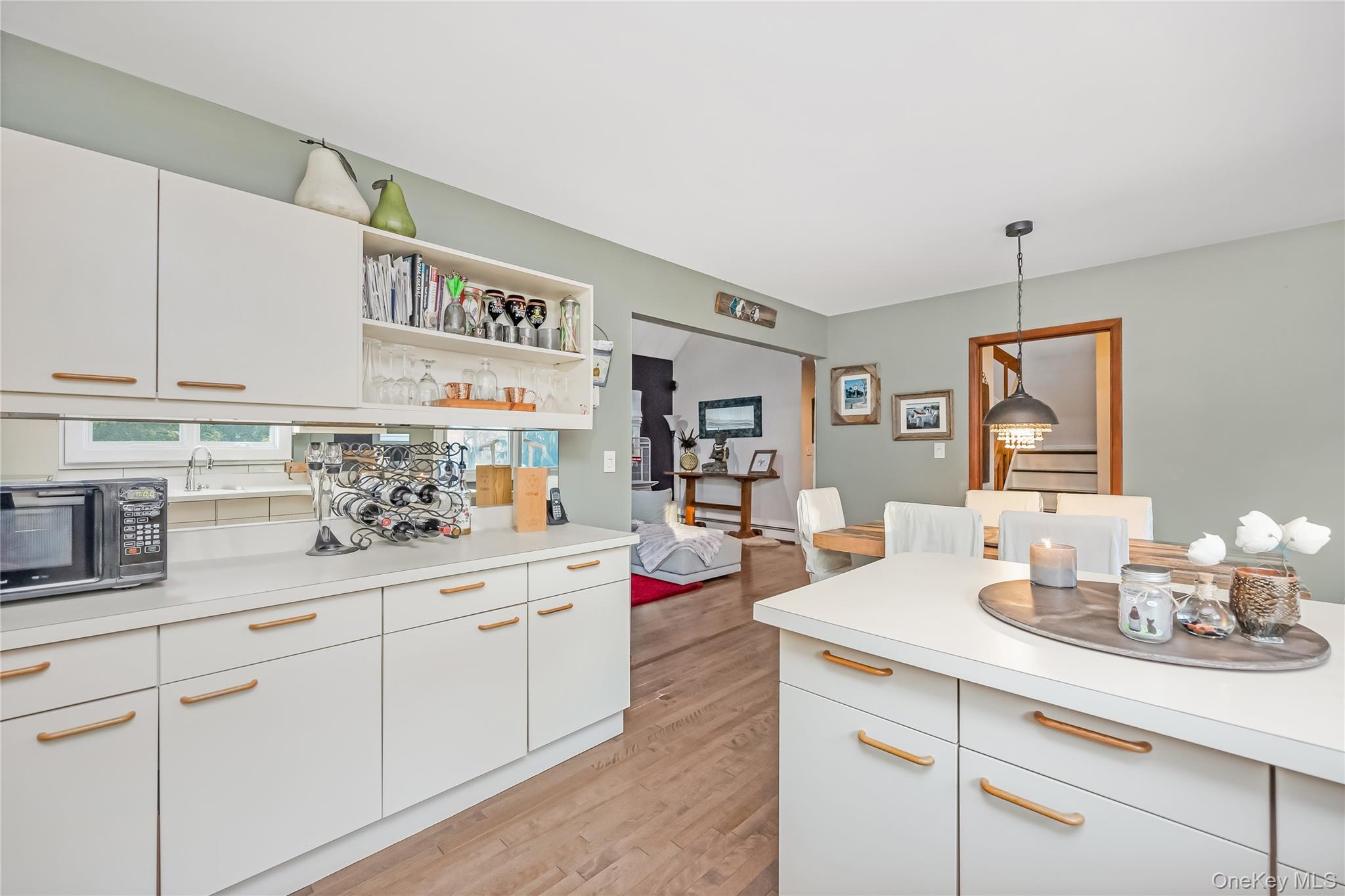 2 Martin Place Northport, NY 11768 - Photo 17 of 24 a kitchen with sink cabinets and window