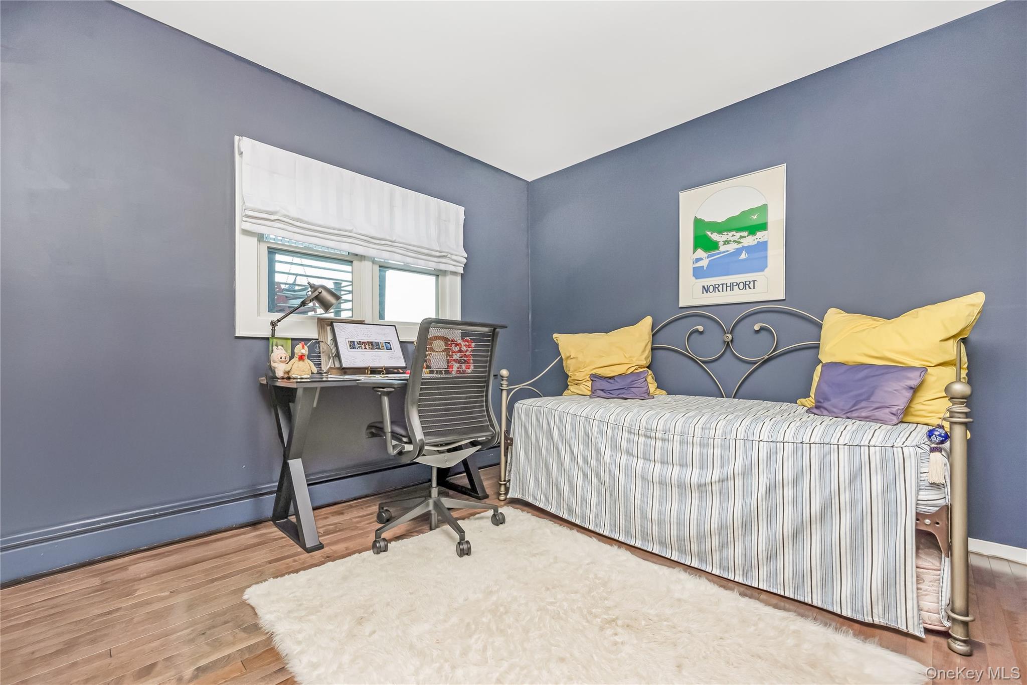 2 Martin Place Northport, NY 11768 - Photo 19 of 24 a bedroom with a bed and a desk