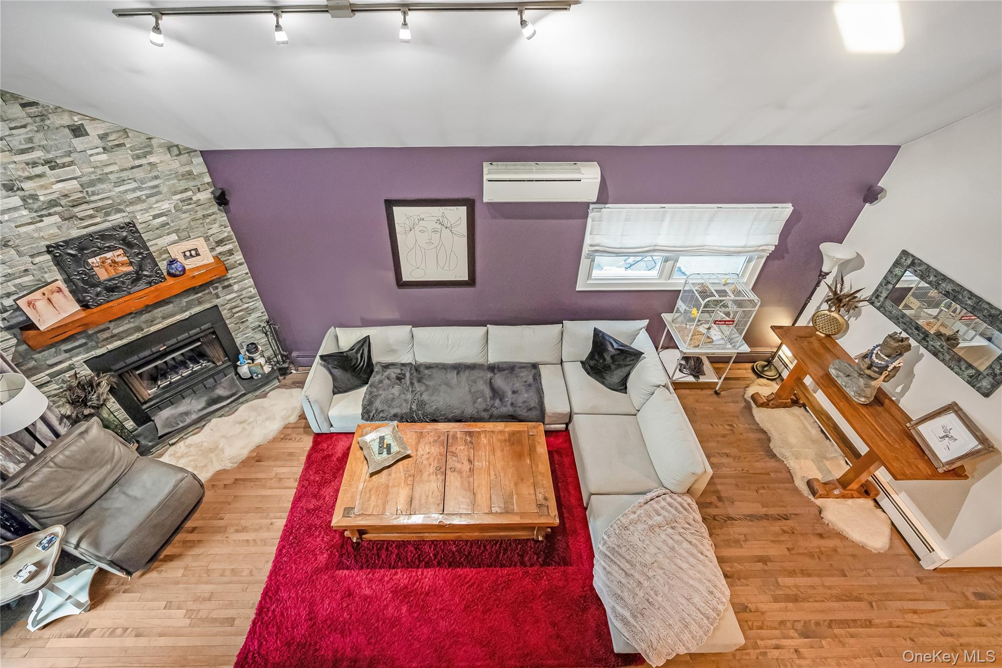 2 Martin Place Northport, NY 11768 - Photo 22 of 24 a bed sitting in a bedroom next to a lamp