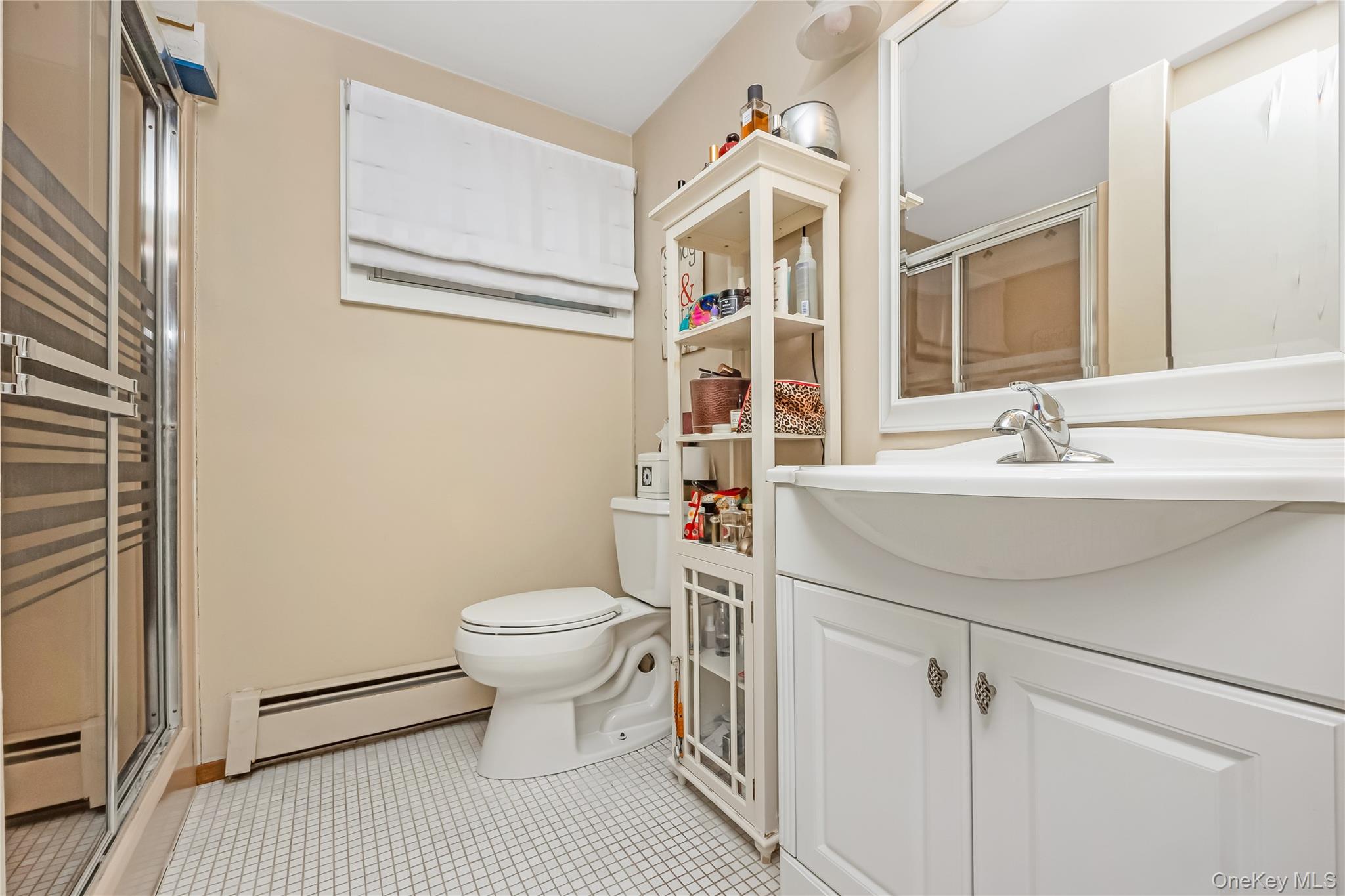 2 Martin Place Northport, NY 11768 - Photo 24 of 24 a bathroom with a sink toilet and shower