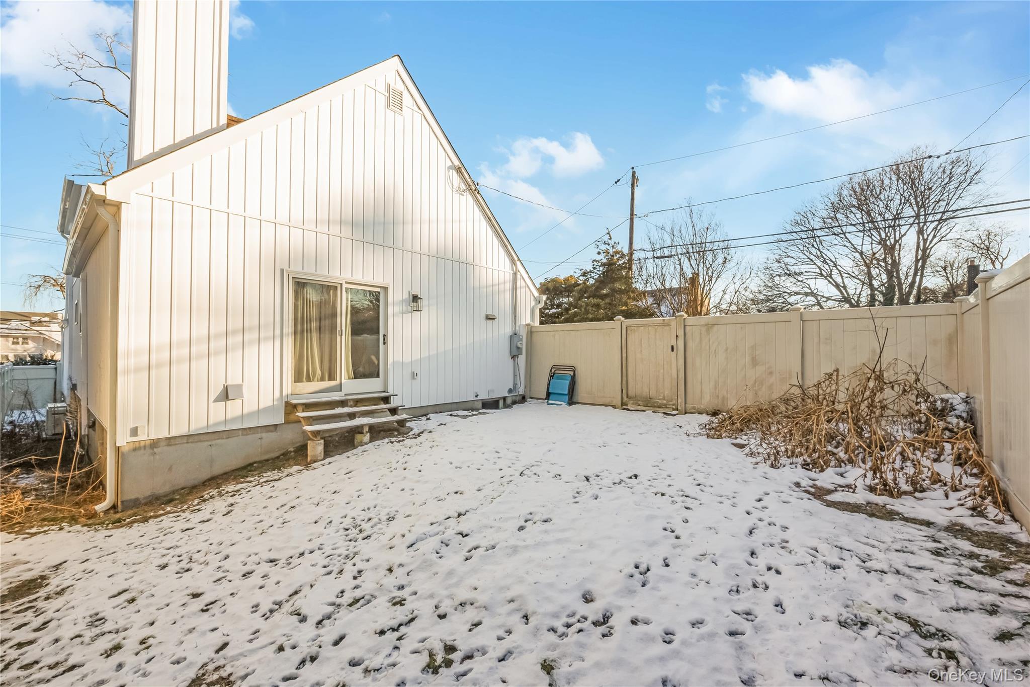 2 Martin Place Northport, NY 11768 - Photo 6 of 24 a view of a house with a snow in the yard