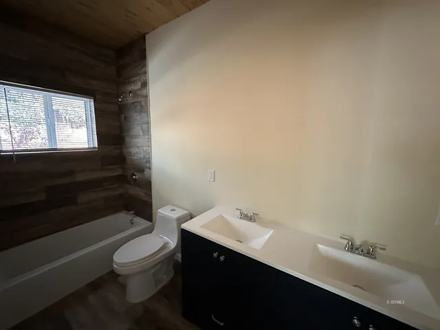 a bathroom with a sink and a toilet