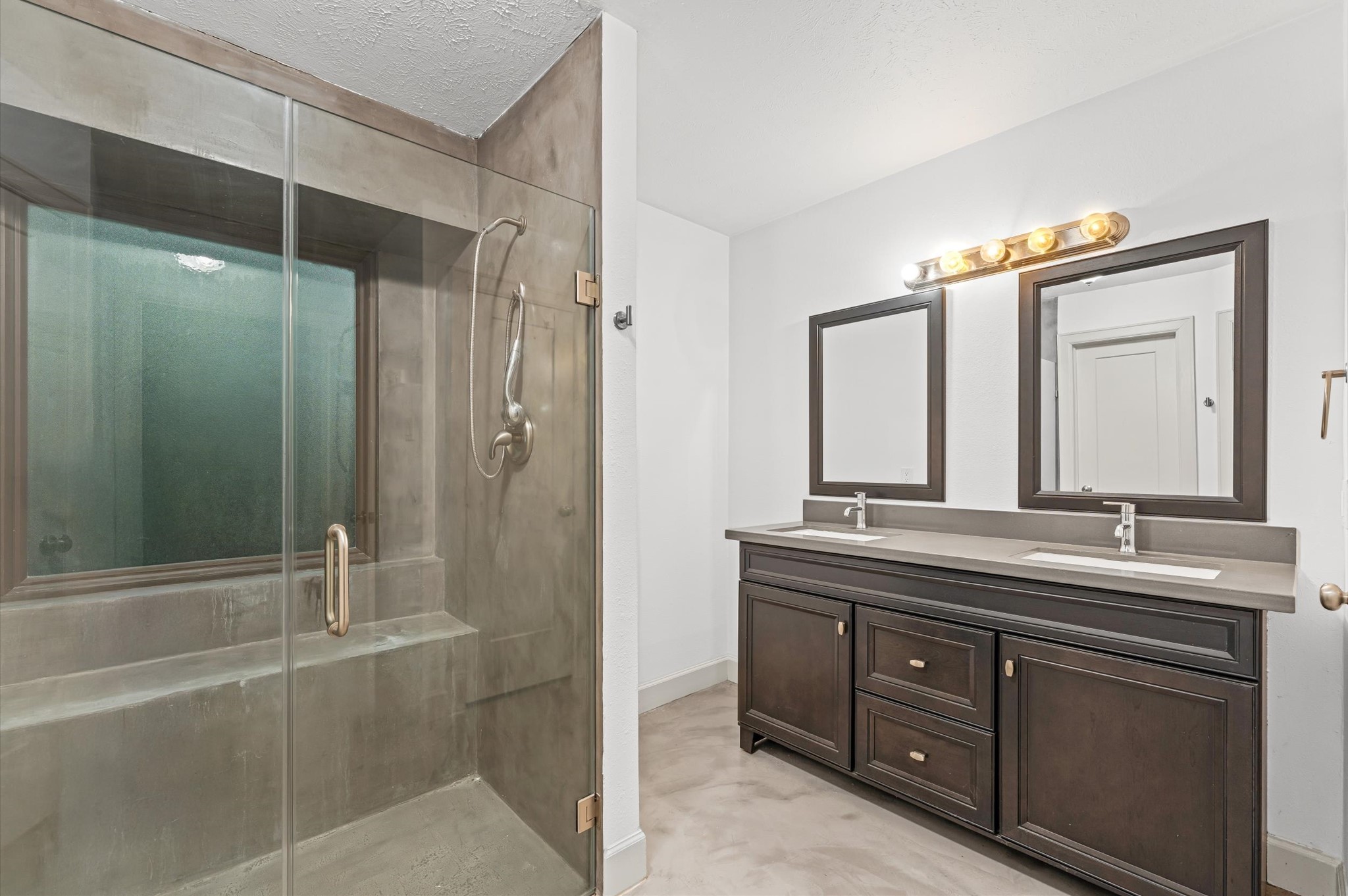 29 South High Oaks Circle Spring, TX 77380 - Photo 12 of 21 a bathroom with a double vanity sink mirror and shower