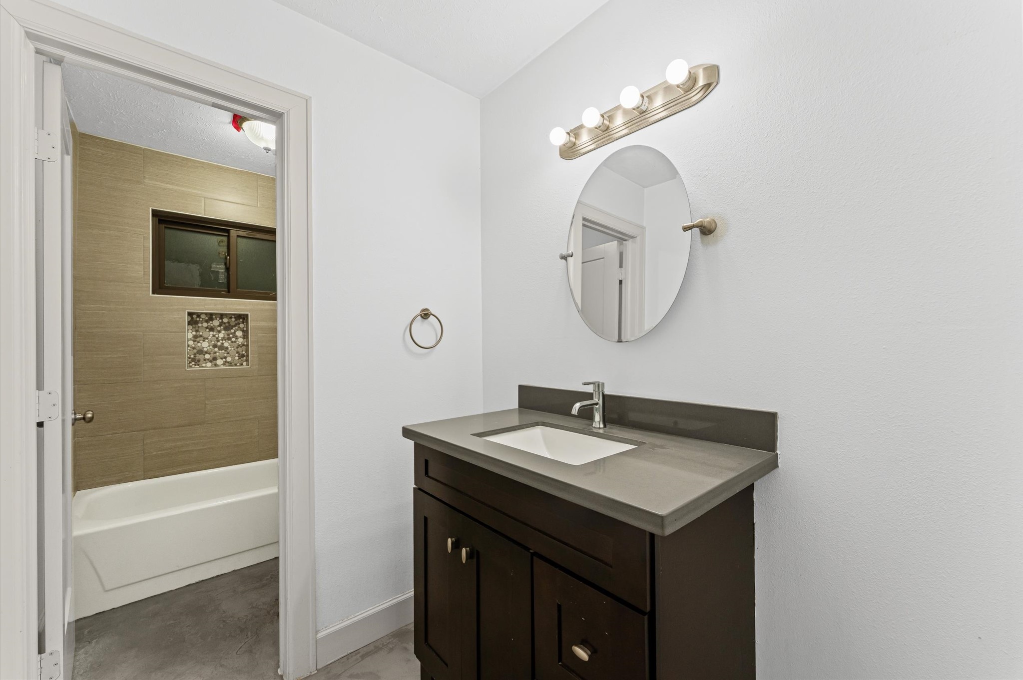 29 South High Oaks Circle Spring, TX 77380 - Photo 16 of 21 a bathroom with a sink and a mirror